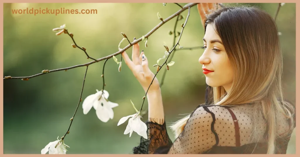 A young woman with straight, light brown hair posing profile-side outdoors while touching a blooming white flower branch, with the website watermark "worldpickuplines.com" in the upper-left corner.