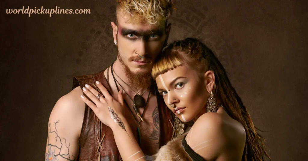 Man and woman posing in tribal or warrior-style makeup, tattoos, and rustic attire.